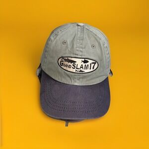 Grand Slam 17" embroidered baseball cap. Adjustable strap.